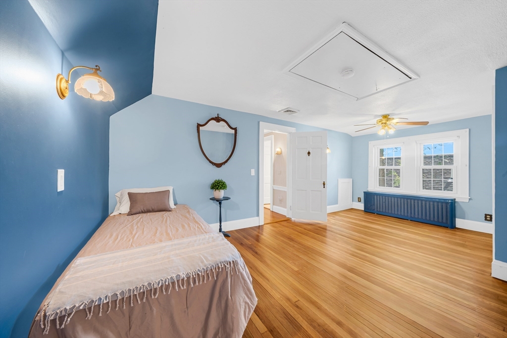 293 Florence Road Waltham, MA 02453 - Photo 28 of 41 a bedroom with a bed and window