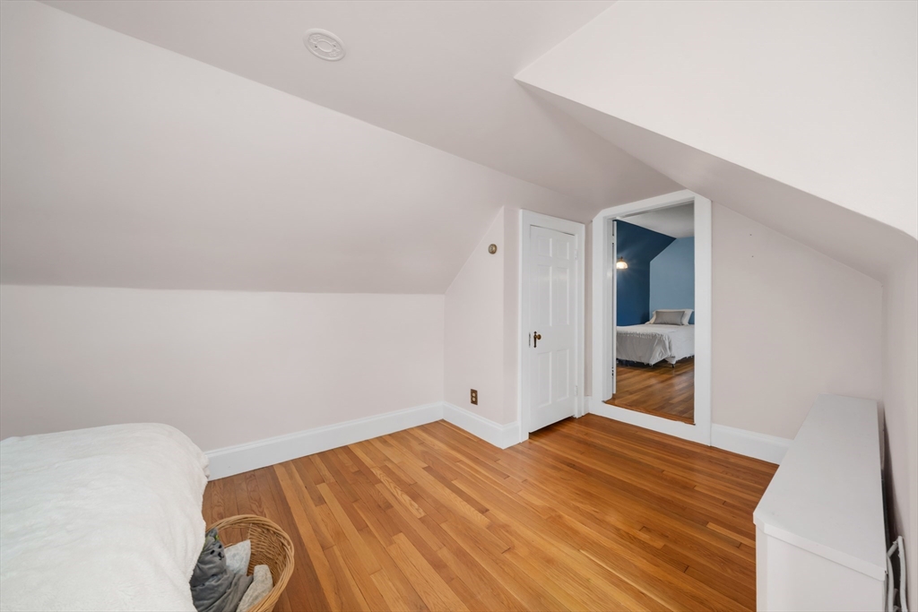 293 Florence Road Waltham, MA 02453 - Photo 33 of 41 a view of a room with wooden floor