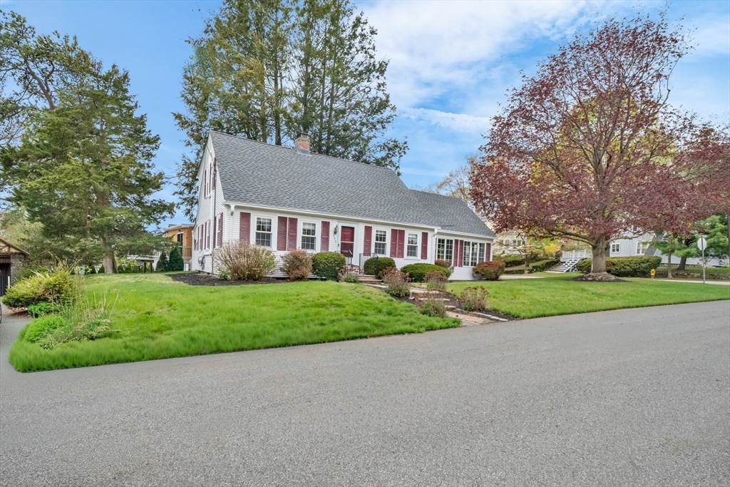 293 Florence Road Waltham, MA 02453 - Photo 39 of 41 a view of a house with a big yard and large trees
