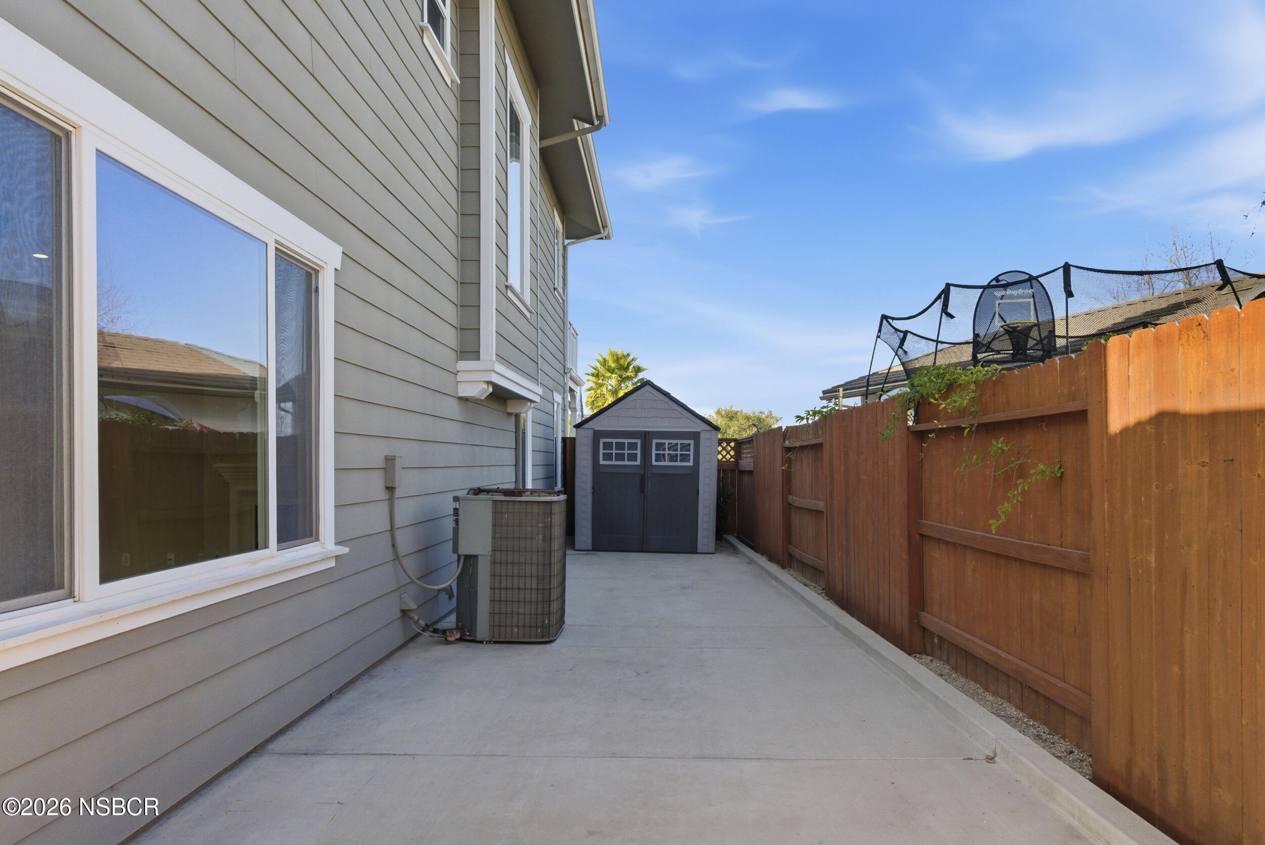 5632 Menemsha Lane Santa Maria, CA 93455 - Photo 53 of 66 a view of a house with a garage and balcony