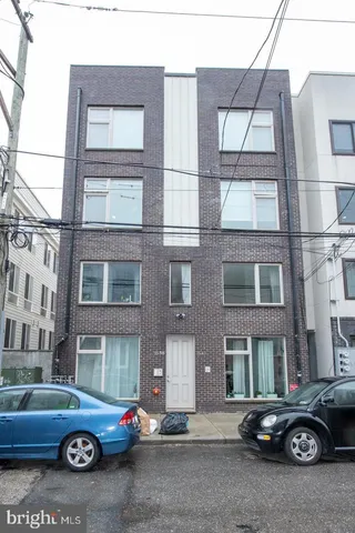 a car parked in front of a building