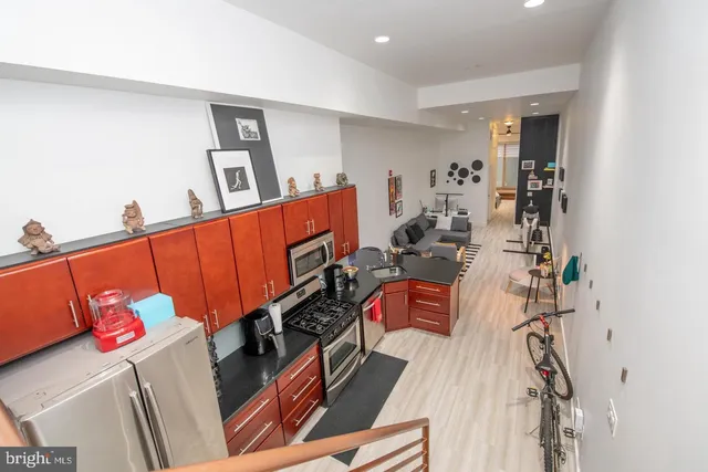 a room with furniture and a wooden floor