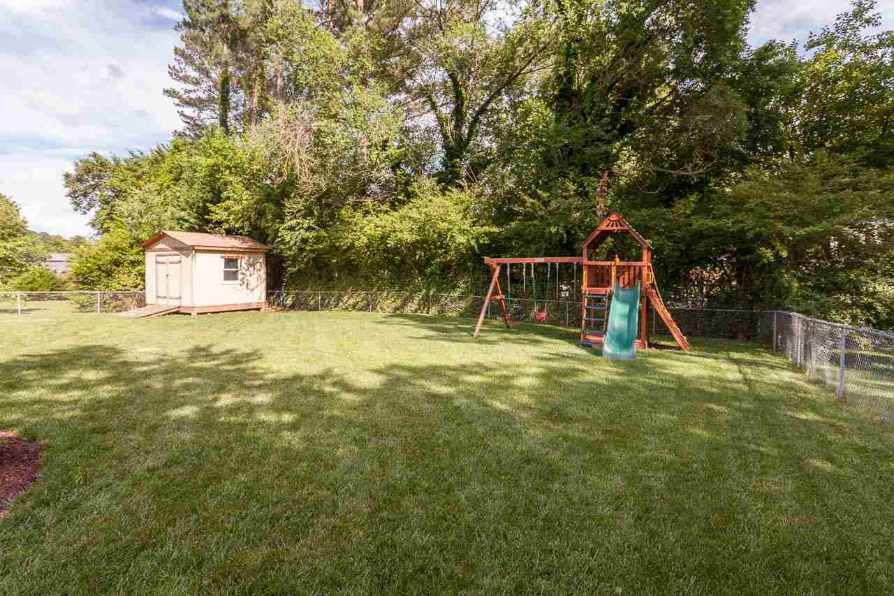 3145 Merrianne Drive Raleigh, NC 27607 - Photo 24 of 25 You will fall in love with the backyard that offers a lush lawn in outstanding condition. It is the perfect backyard for fun and games ( and a vegetable garden too!). The backyard is fully fenced. Amazing Backyard