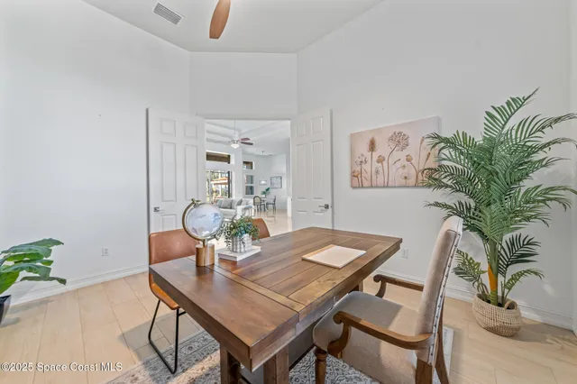a workspace with furniture and wooden floor