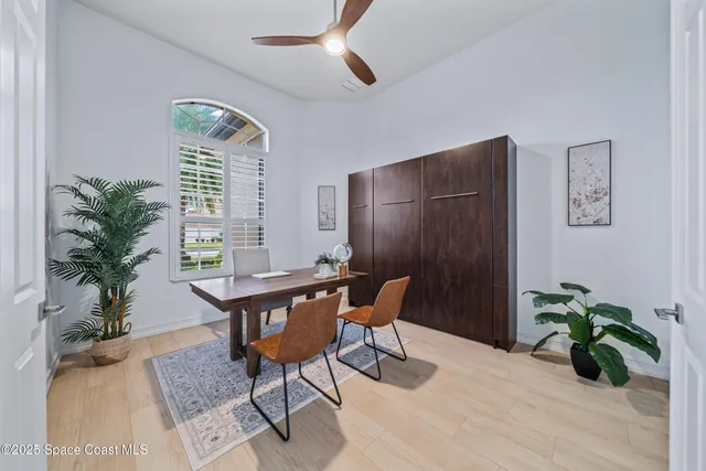 a view of a dining room with furniture