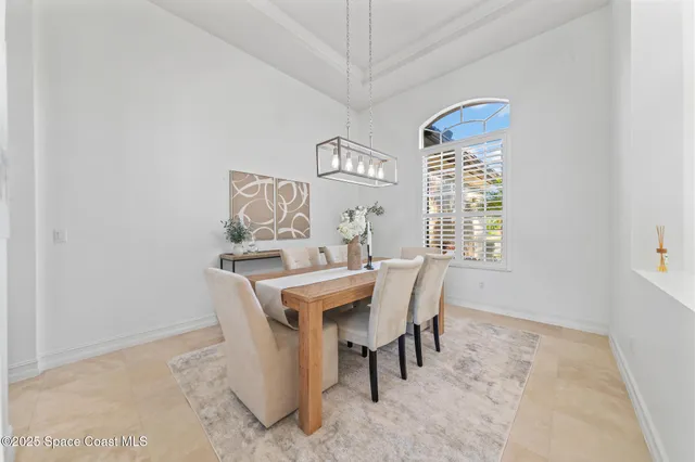 a kitchen with stainless steel appliances kitchen island granite countertop a sink stove and cabinets
