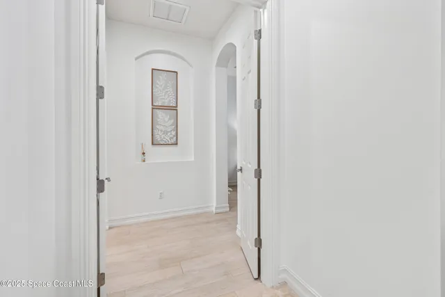 a view of a room with racks on the wall