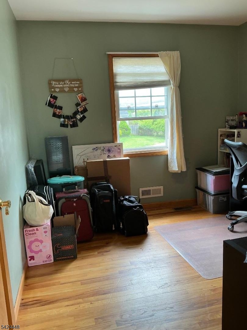 20 Nottingham Drive Howell, NJ 07731 - Photo 17 of 21 a room with furniture and a window