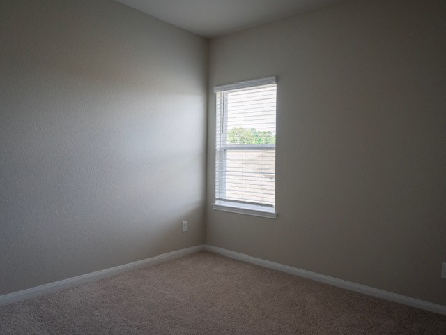 2533 Sturgeon Way Conroe, TX 77384 - Photo 16 of 30 an empty room with a window