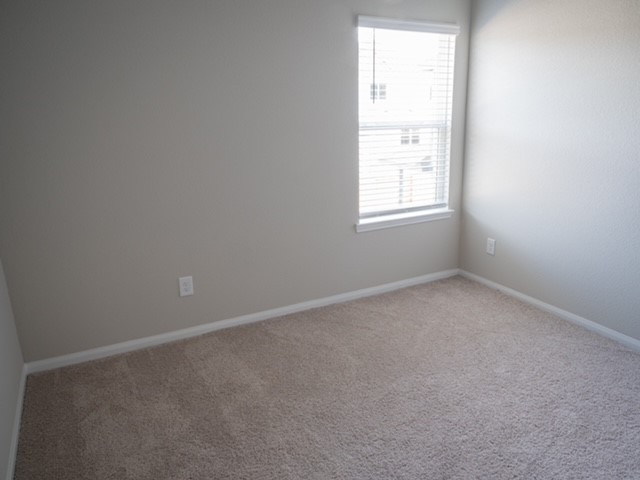2533 Sturgeon Way Conroe, TX 77384 - Photo 22 of 30 an empty room with a window