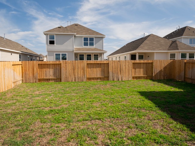 2533 Sturgeon Way Conroe, TX 77384 - Photo 28 of 30 a front view of a house with a garden