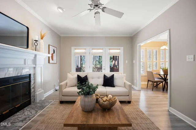 a vase of flowers sitting on a dining table