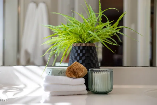 an empty room with a ceiling fan and a window