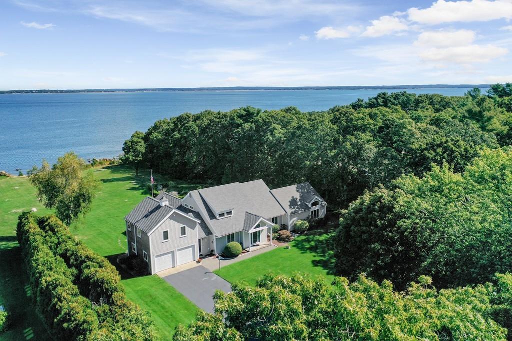69 Piney Point Road Marion, MA 02738 - Photo 1 of 16 an aerial view of a house with garden space and street view