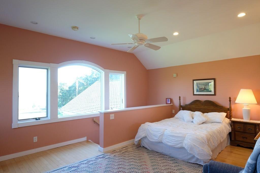 69 Piney Point Road Marion, MA 02738 - Photo 12 of 16 a bedroom with a bed and a window