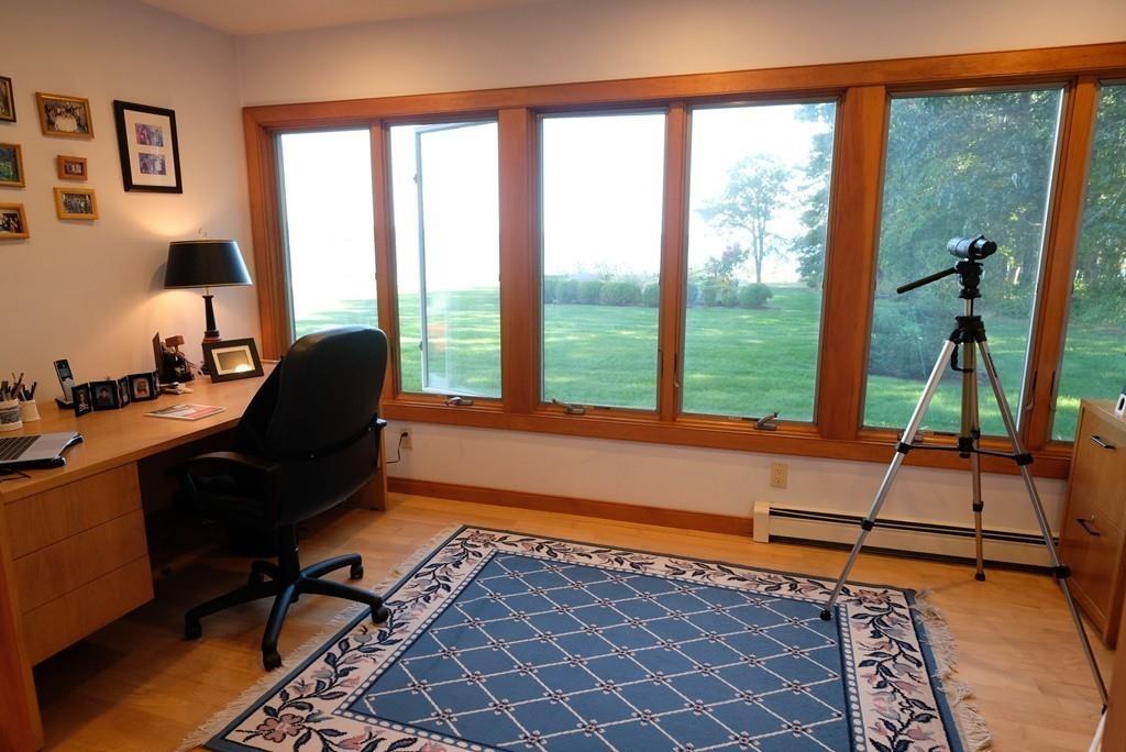 69 Piney Point Road Marion, MA 02738 - Photo 14 of 16 a work room with furniture and a large window