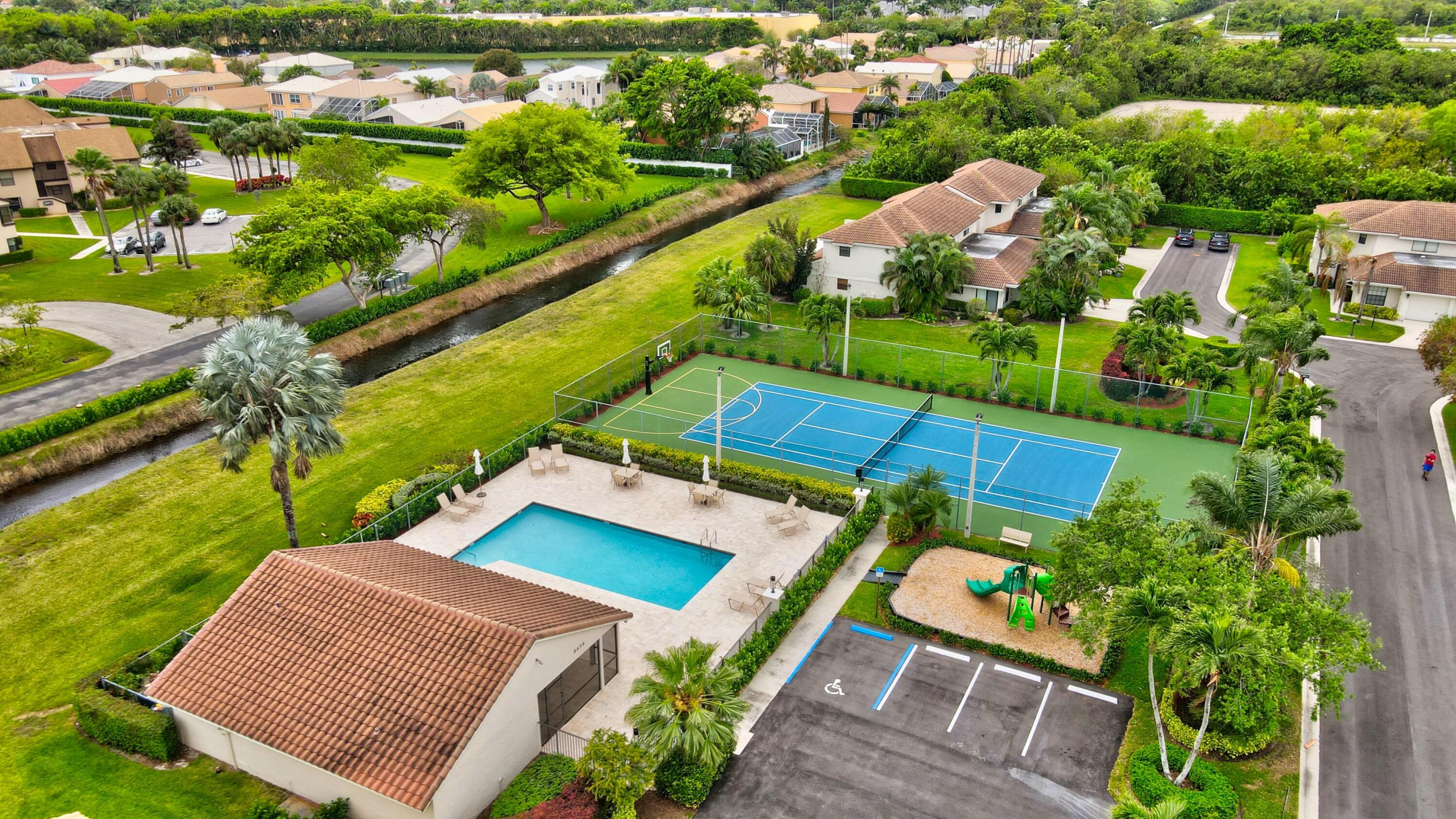 8746 Eagle Run Drive Boca Raton, FL 33434 - Photo 48 of 53 tennis/clubhouse