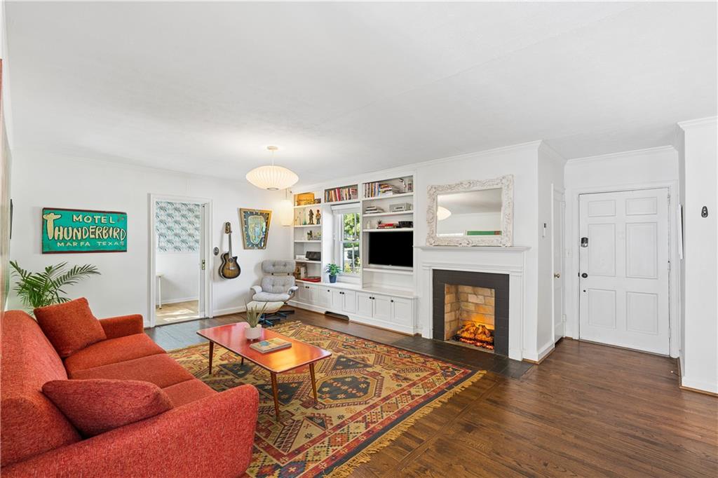 2494 Batavia Street Atlanta, GA 30344 - Photo 12 of 48 a living room with furniture and a fireplace
