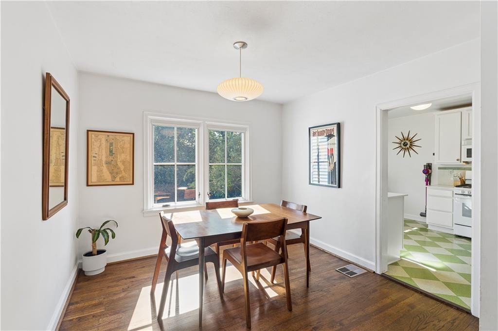 2494 Batavia Street Atlanta, GA 30344 - Photo 14 of 48 a view of a dining room with furniture window and wooden floor