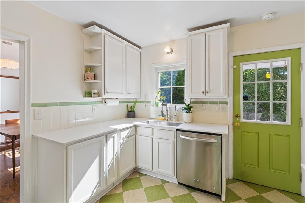 2494 Batavia Street Atlanta, GA 30344 - Photo 19 of 48 a kitchen with a sink cabinets and window