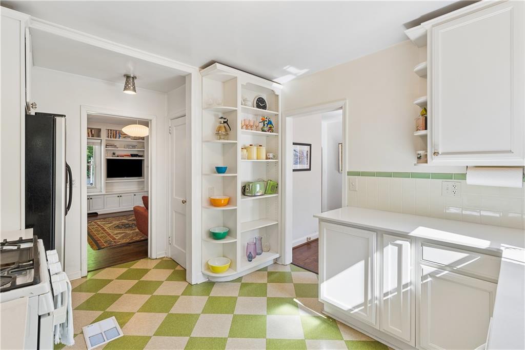 2494 Batavia Street Atlanta, GA 30344 - Photo 20 of 48 a bedroom with a bed and a view of living room