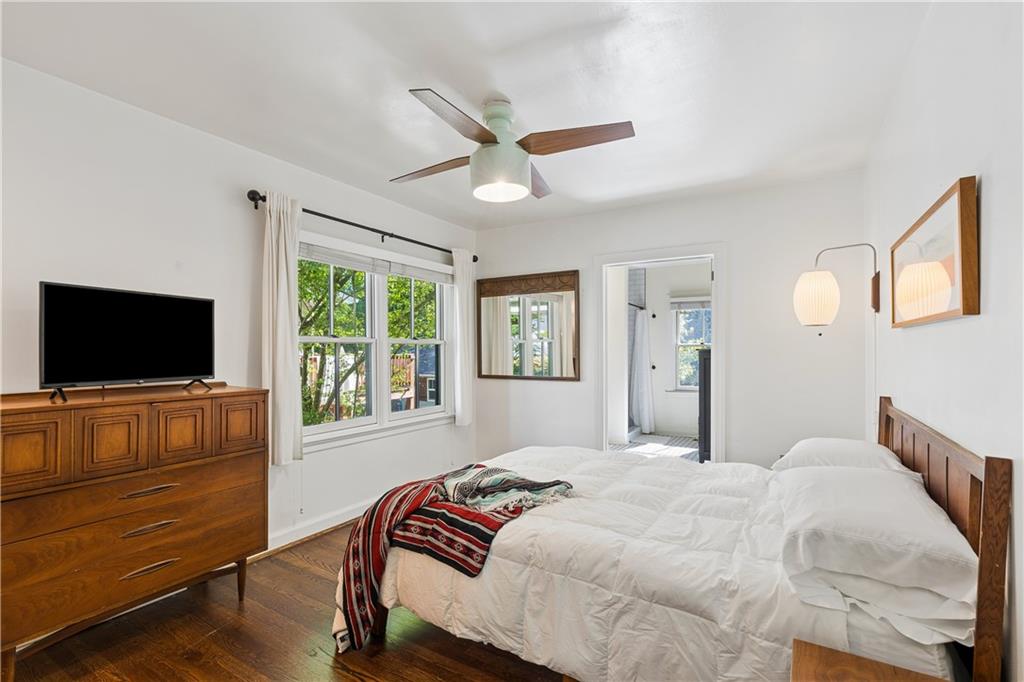 2494 Batavia Street Atlanta, GA 30344 - Photo 26 of 48 a bedroom with a bed and a flat screen tv