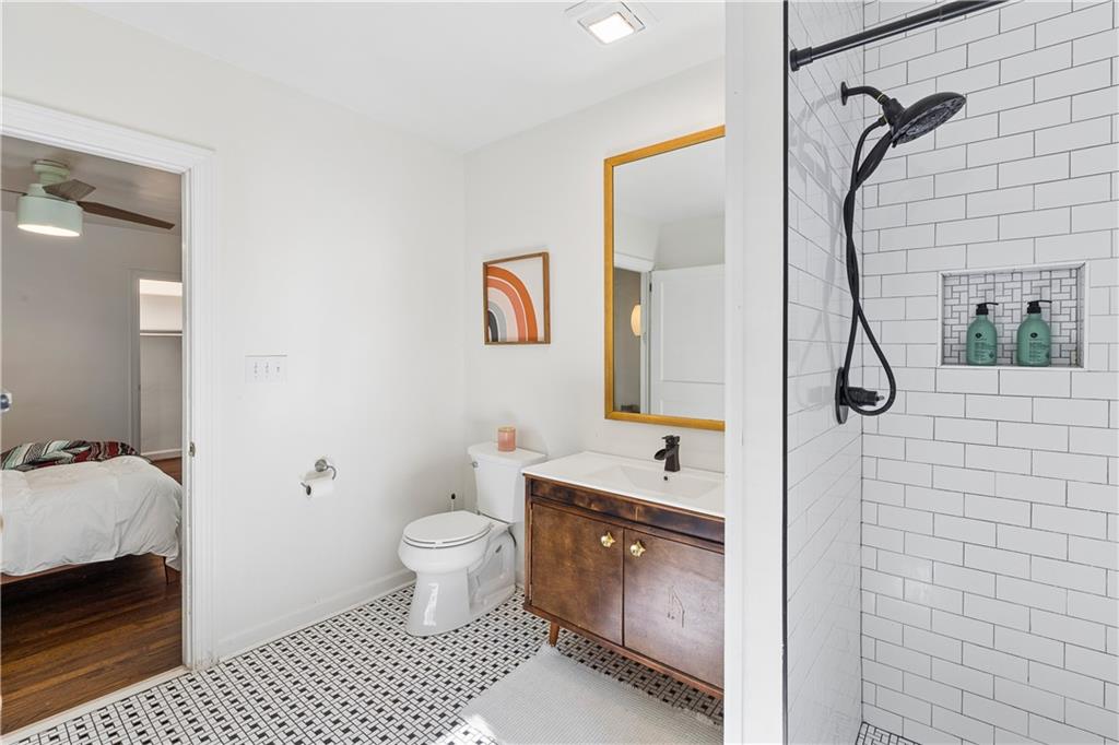 2494 Batavia Street Atlanta, GA 30344 - Photo 31 of 48 a bathroom with a sink toilet and shower