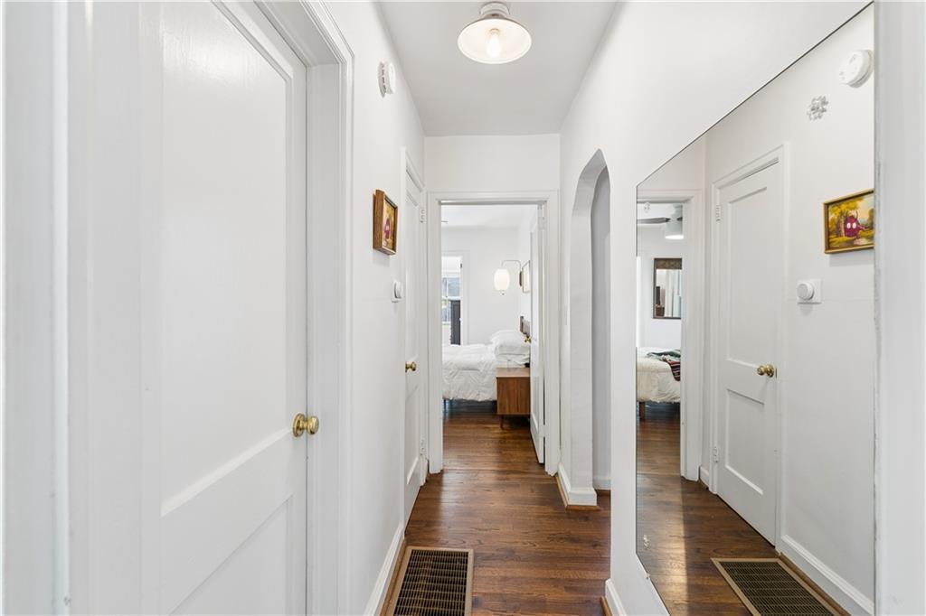 2494 Batavia Street Atlanta, GA 30344 - Photo 32 of 48 a view of a hallway with wooden floor and a bathroom