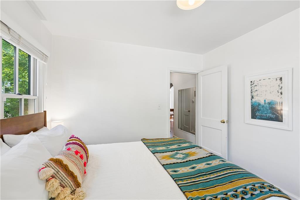 2494 Batavia Street Atlanta, GA 30344 - Photo 36 of 48 a bedroom with a bed and a window