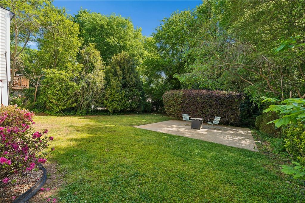 2494 Batavia Street Atlanta, GA 30344 - Photo 44 of 48 a view of a patio with table and chairs and potted plants