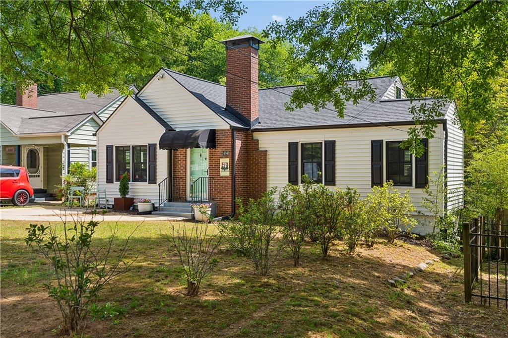 2494 Batavia Street Atlanta, GA 30344 - Photo 6 of 48 a house view with a sitting space and garden