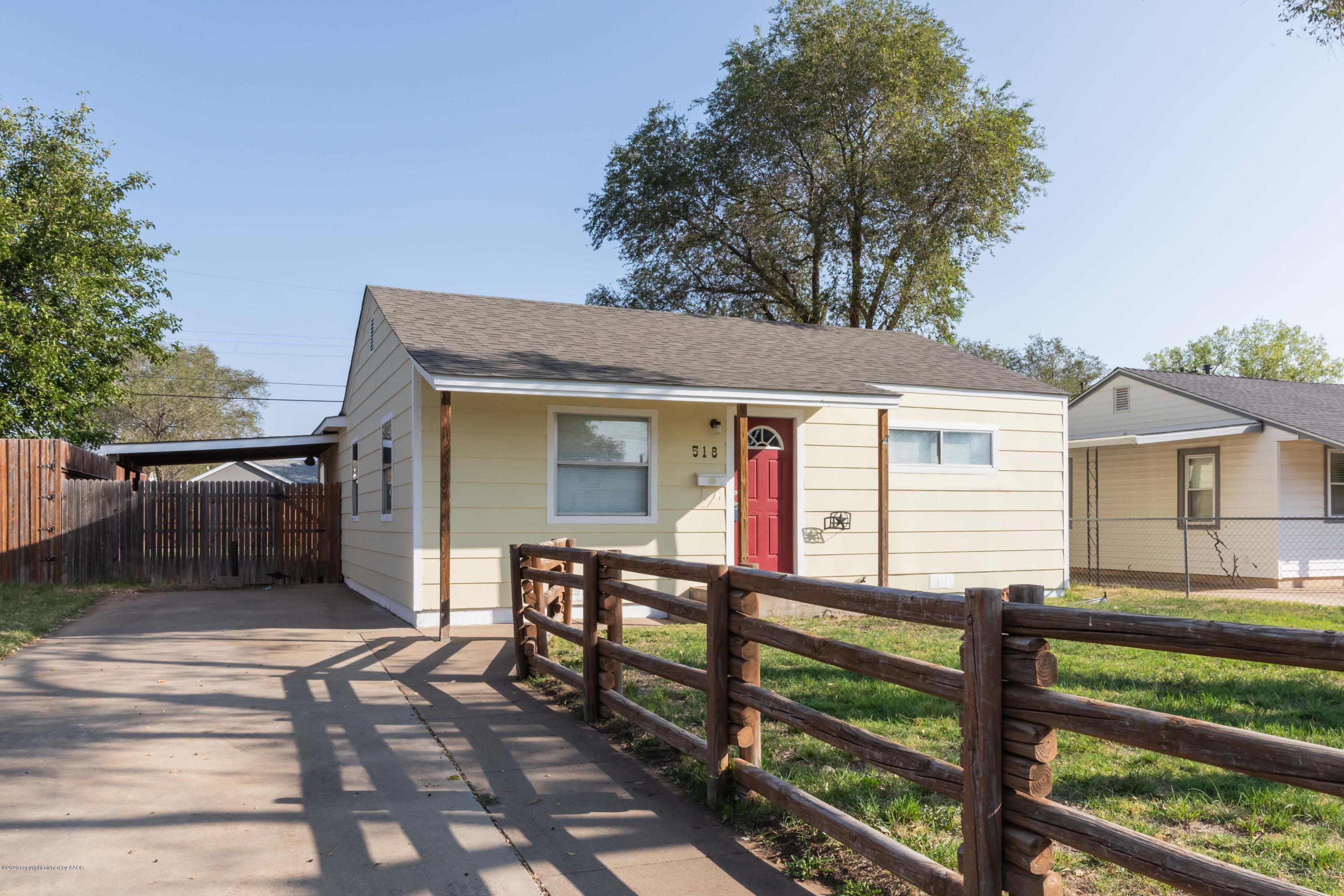 518 Southwest 45th Avenue Amarillo, TX 79110 - Photo 1 of 35 a view of a house with wooden deck and a backyard
