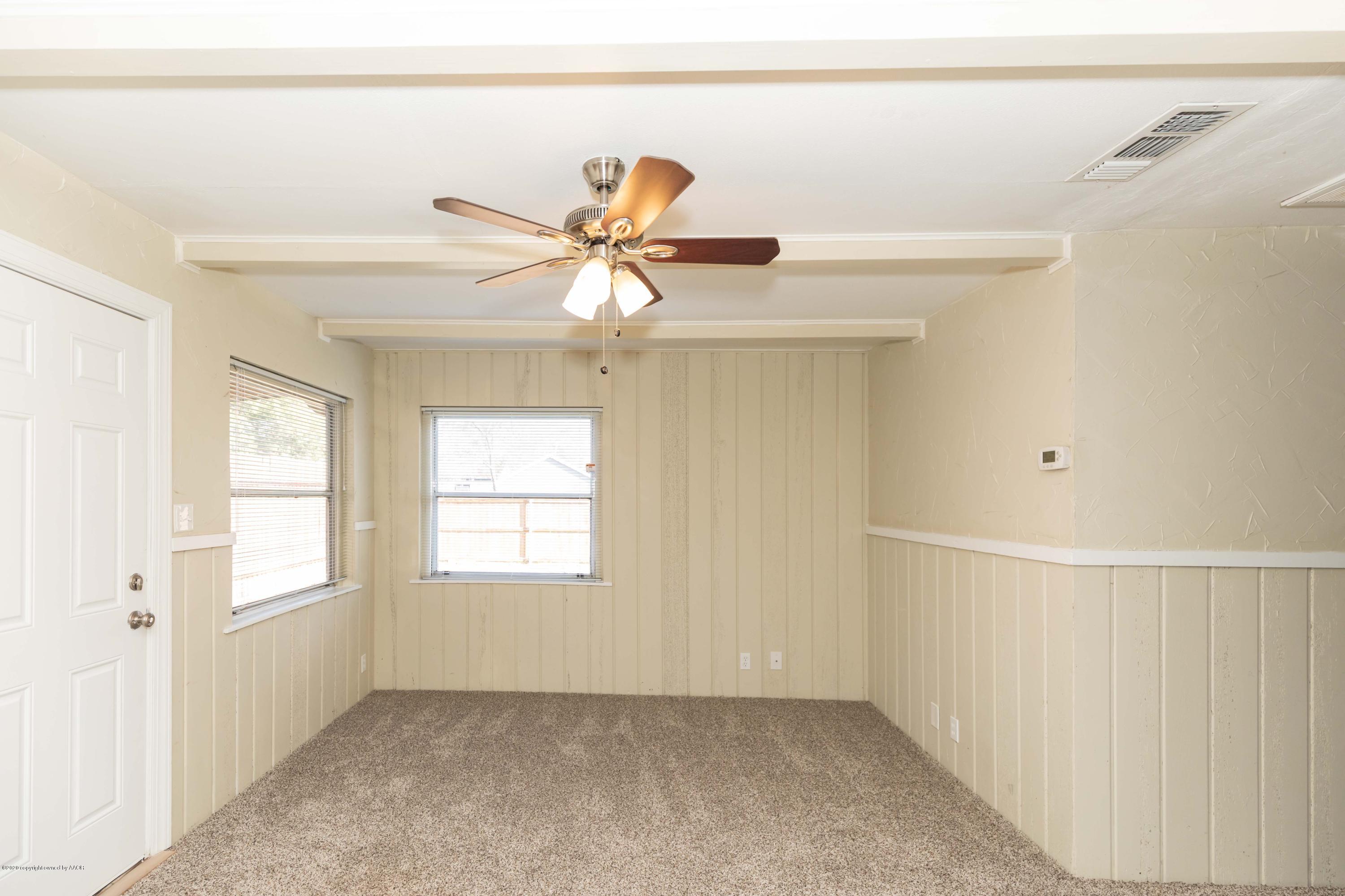 518 Southwest 45th Avenue Amarillo, TX 79110 - Photo 15 of 35 a view of an empty room with a window