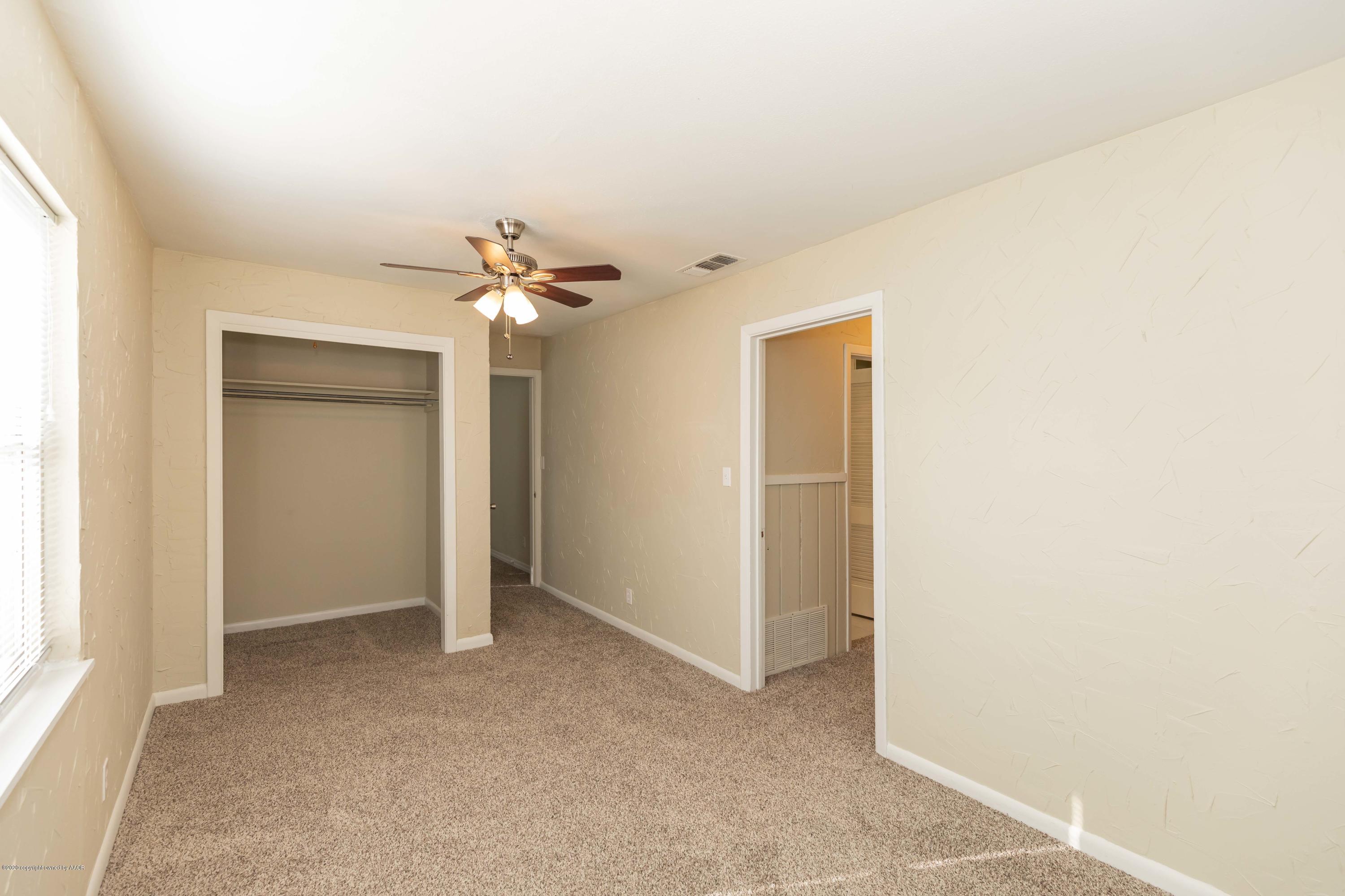 518 Southwest 45th Avenue Amarillo, TX 79110 - Photo 19 of 35 a view of an empty room with a window