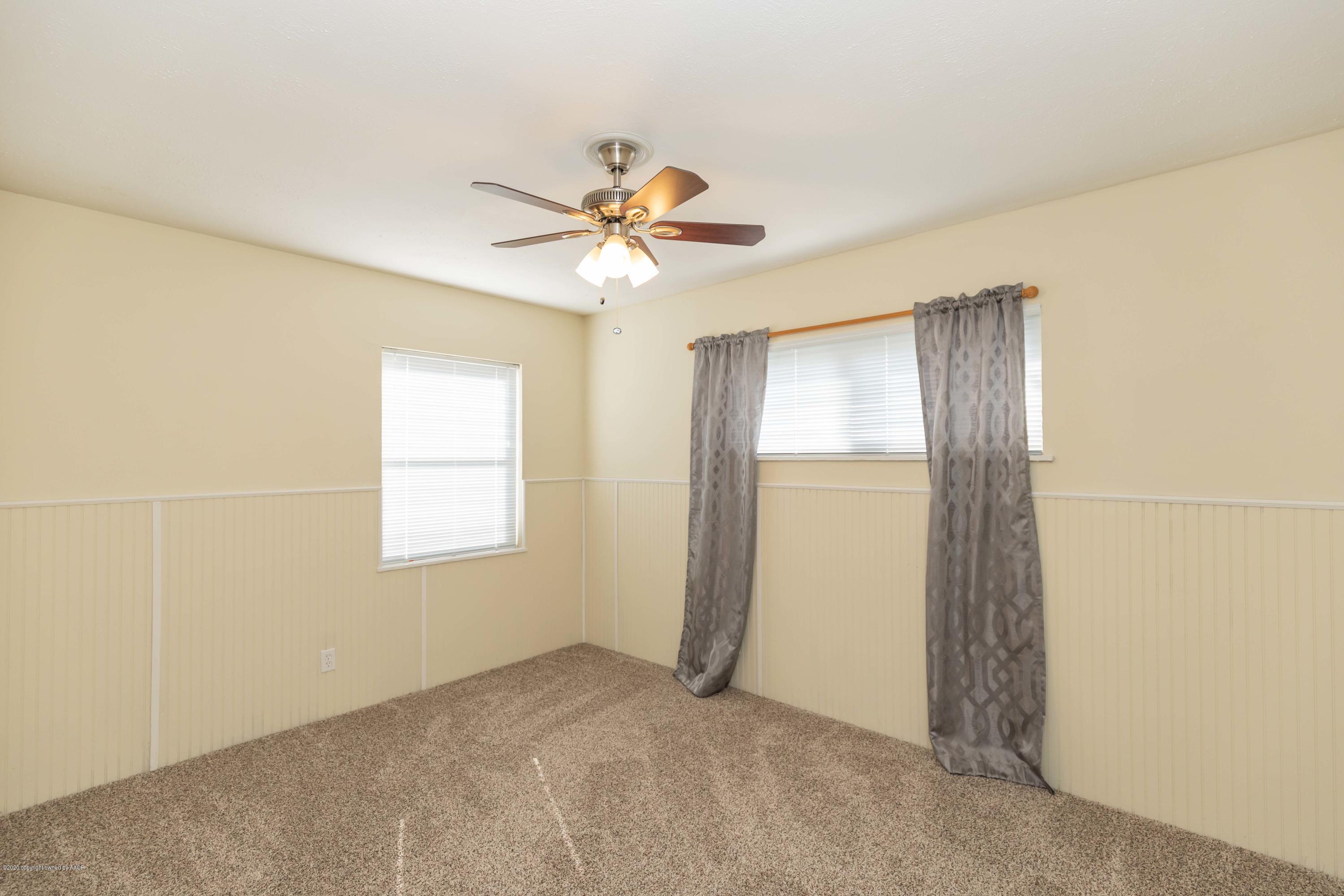 518 Southwest 45th Avenue Amarillo, TX 79110 - Photo 20 of 35 a view of an empty room with a window