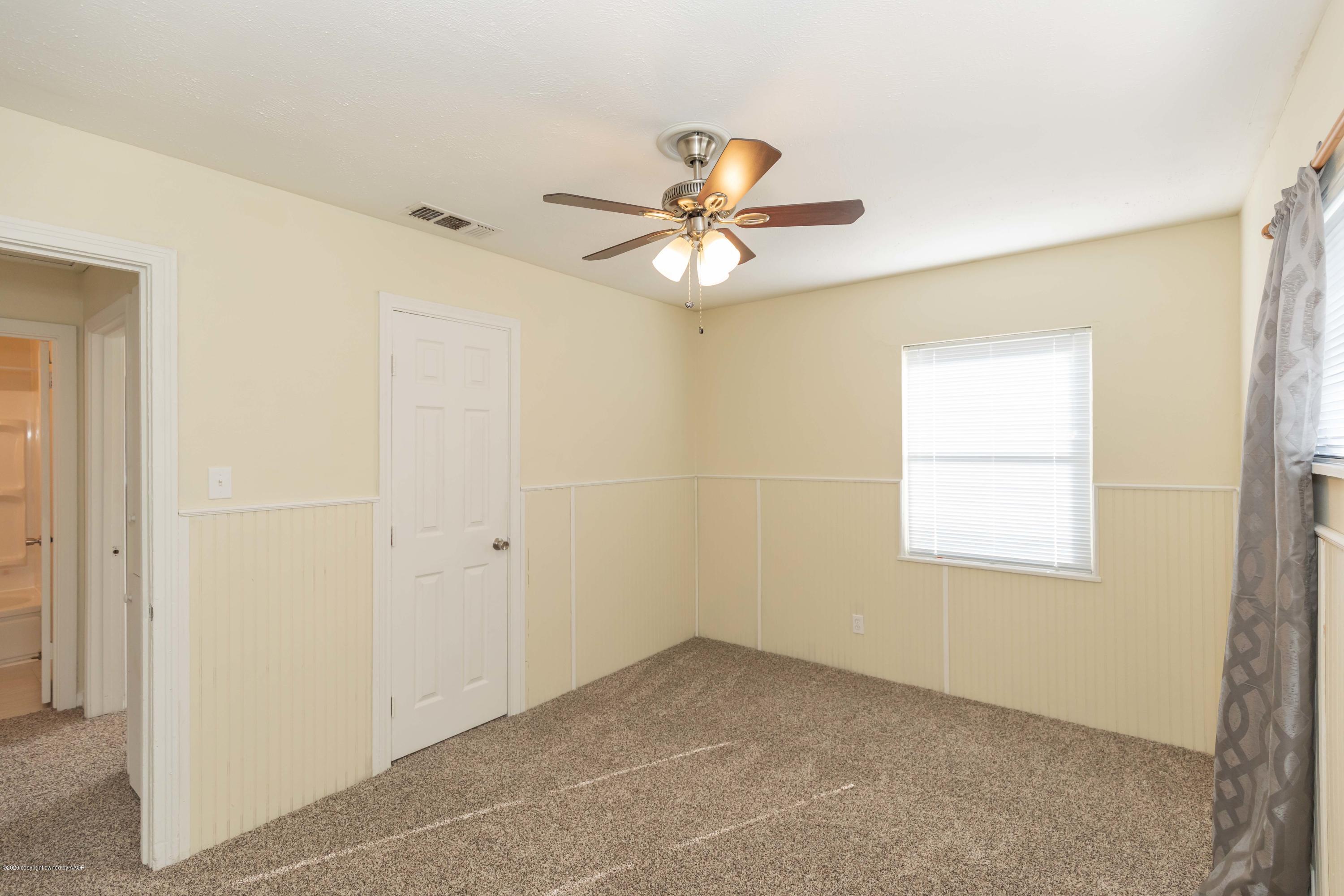 518 Southwest 45th Avenue Amarillo, TX 79110 - Photo 21 of 35 a view of an empty room with a window