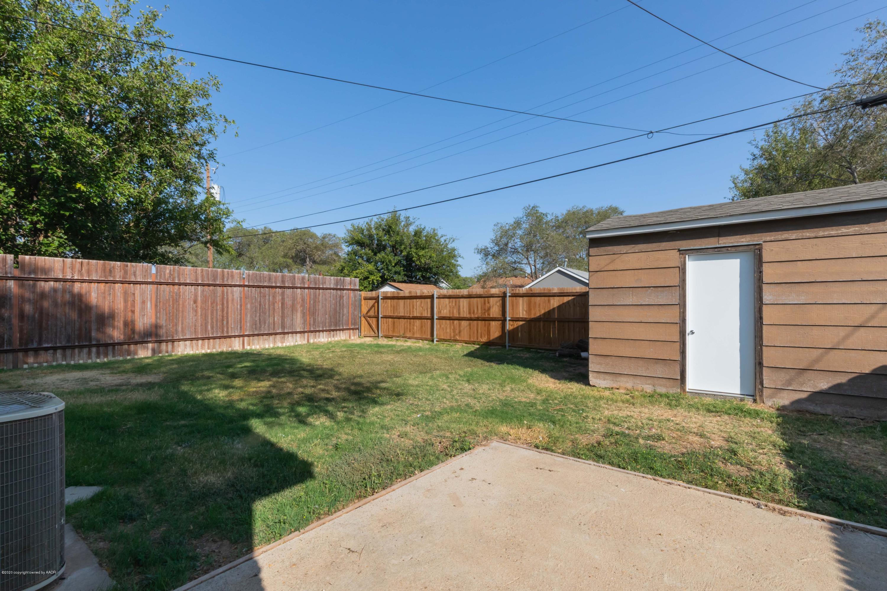 518 Southwest 45th Avenue Amarillo, TX 79110 - Photo 35 of 35 a view of a backyard with wooden fence
