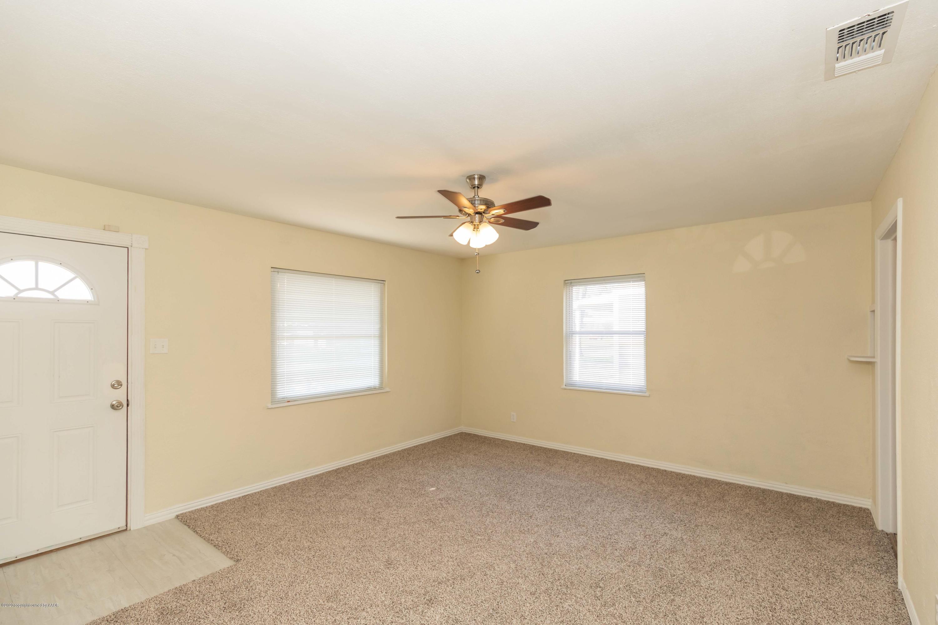 518 Southwest 45th Avenue Amarillo, TX 79110 - Photo 5 of 35 a view of an empty room with a window