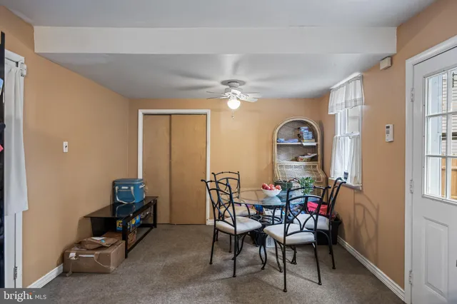 a view of a livingroom with furniture