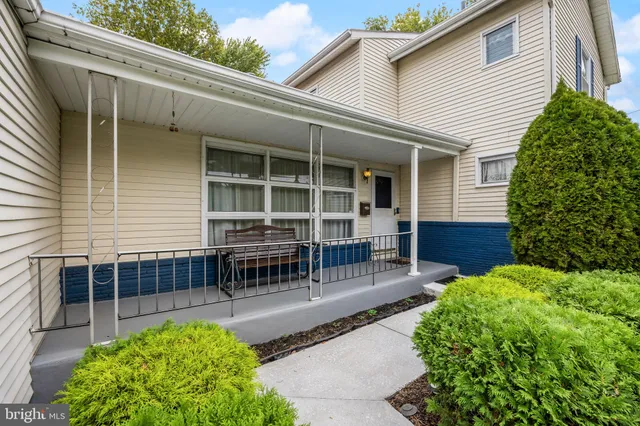 a backyard of a house with seating space