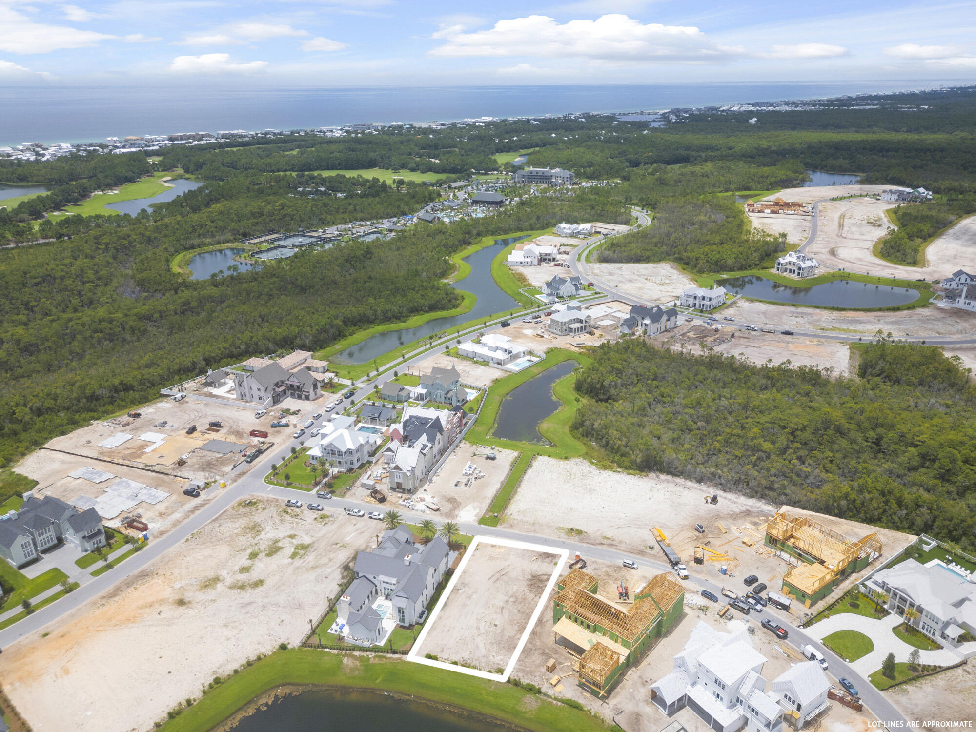 Lot 238 Quail Hollow Inlet Beach, FL 32461 - Photo 11 of 20 a view of a lake with a city
