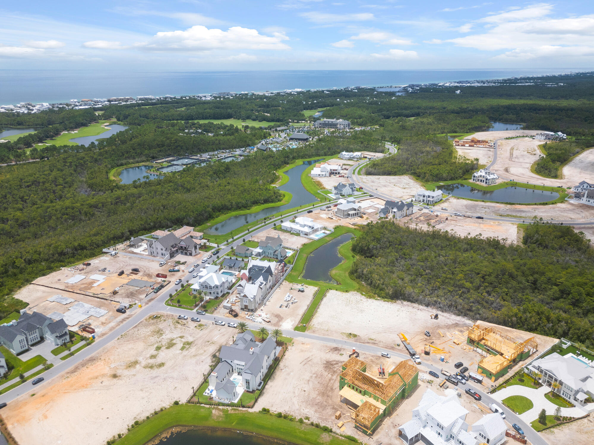 Lot 238 Quail Hollow Inlet Beach, FL 32461 - Photo 14 of 20 a view of a lake with a garden