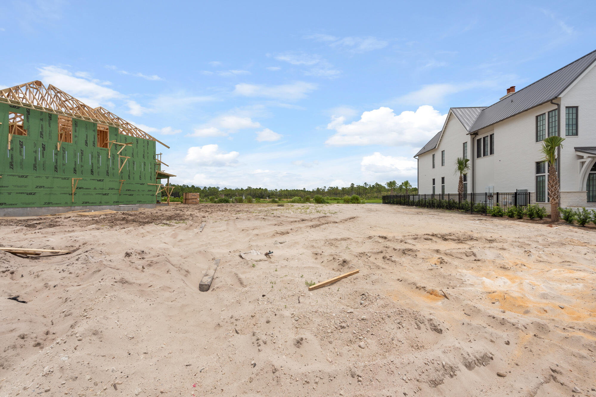 Lot 238 Quail Hollow Inlet Beach, FL 32461 - Photo 17 of 20 a view of a dry yard with wooden fence