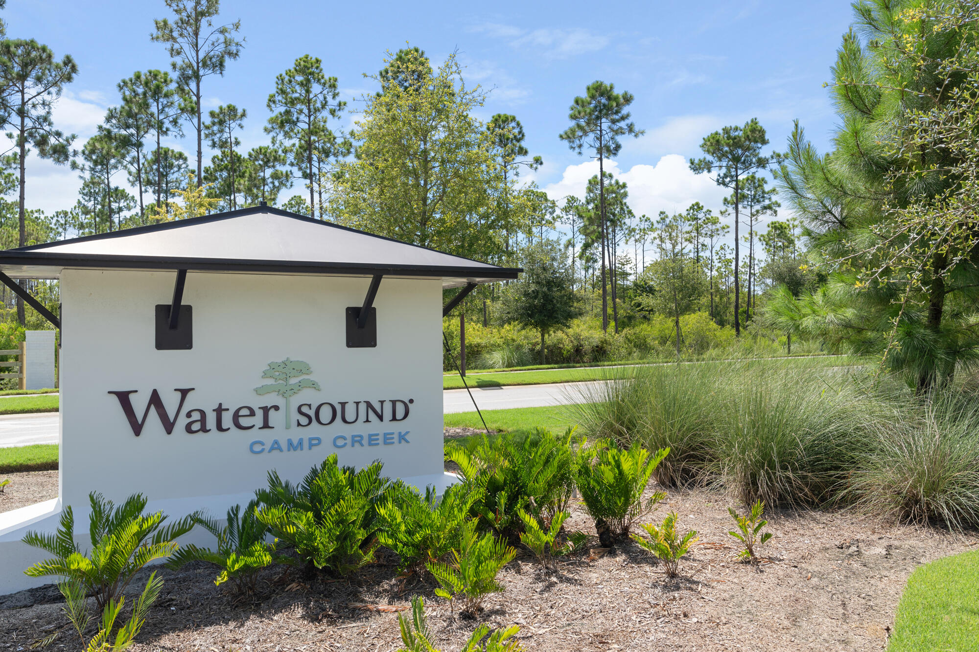 Lot 238 Quail Hollow Inlet Beach, FL 32461 - Photo 19 of 20 a view of a house with a garden