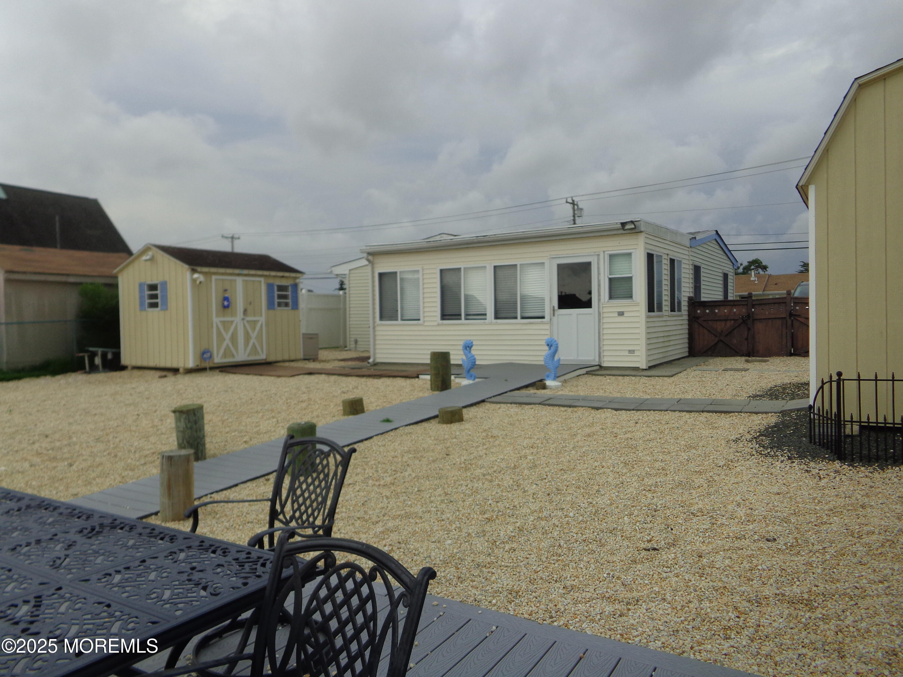 1045 Radio Road Little Egg Harbor, NJ 08087 - Photo 14 of 16 a house view with a outdoor space