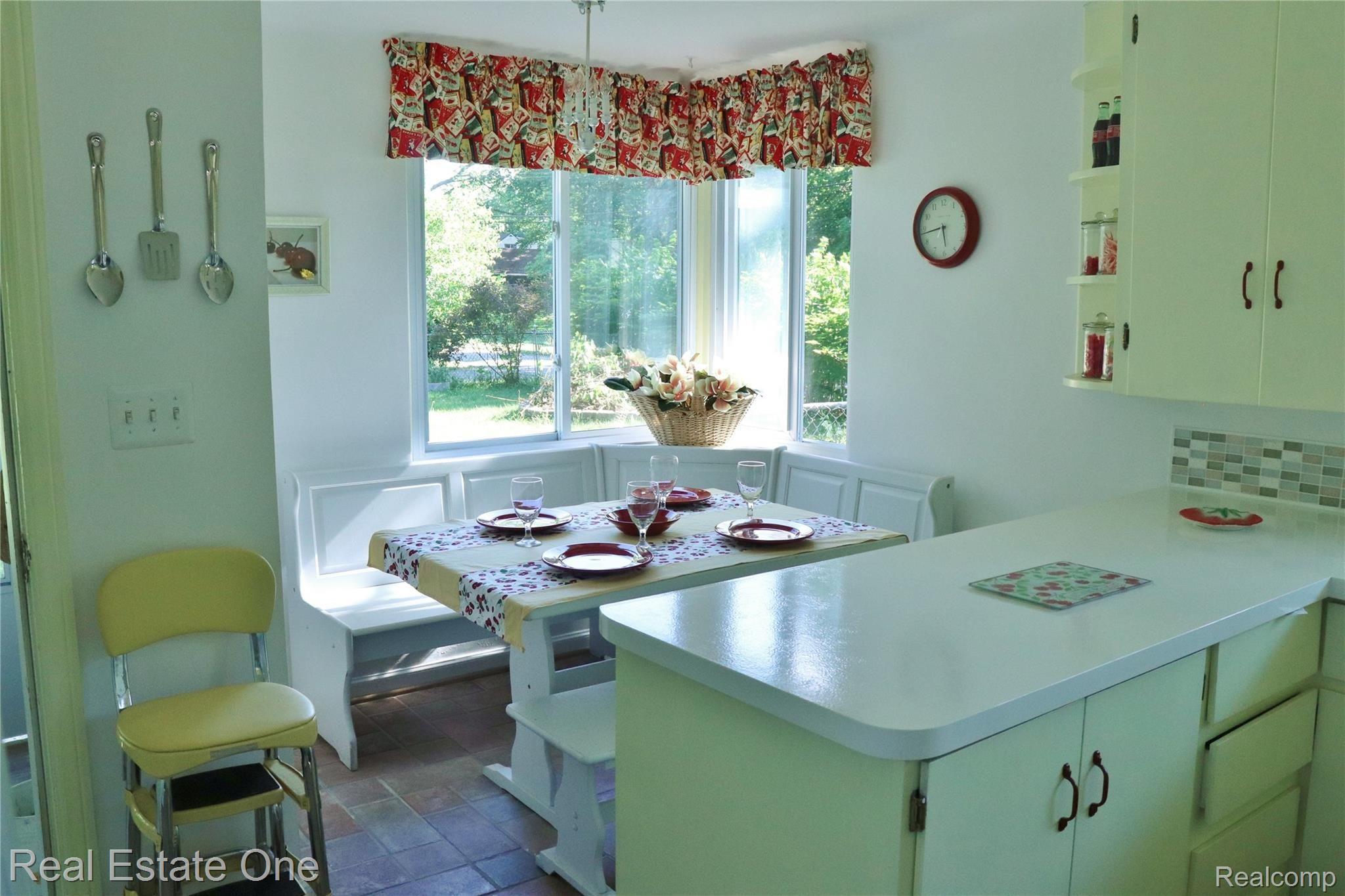 Breakfast area has built in bench.