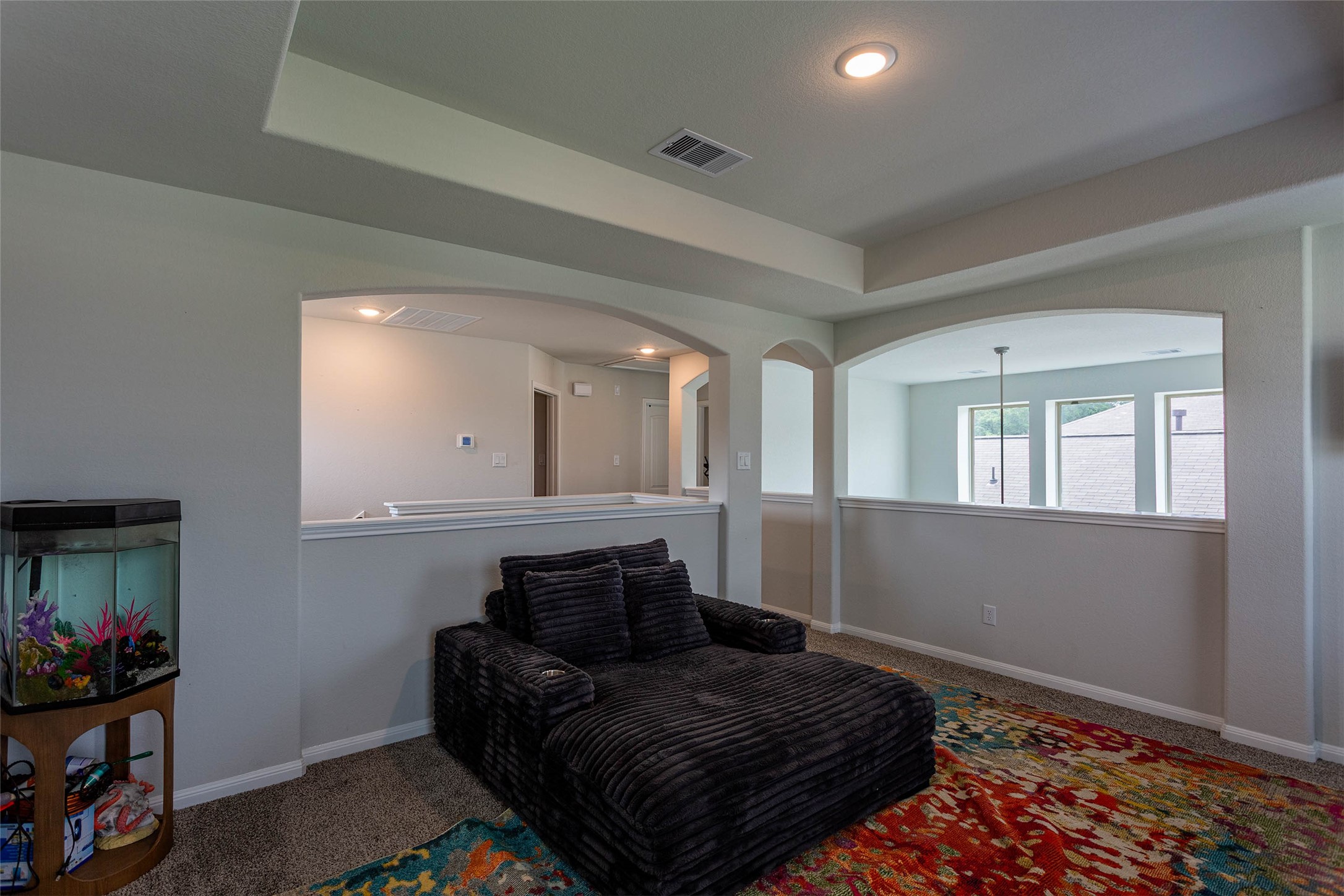 14212 Shasta Ridge Drive Conroe, TX 77303 - Photo 11 of 21 a living room with furniture and a window