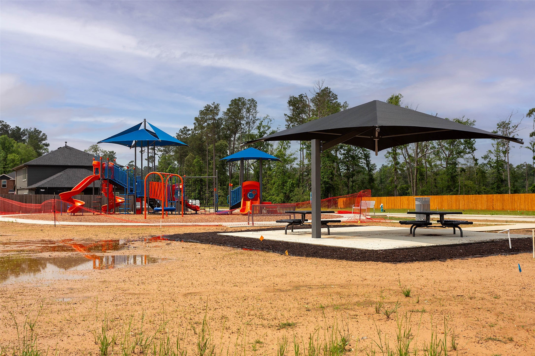 14212 Shasta Ridge Drive Conroe, TX 77303 - Photo 18 of 21 a view of swimming pool with outdoor seating and trees in the background
