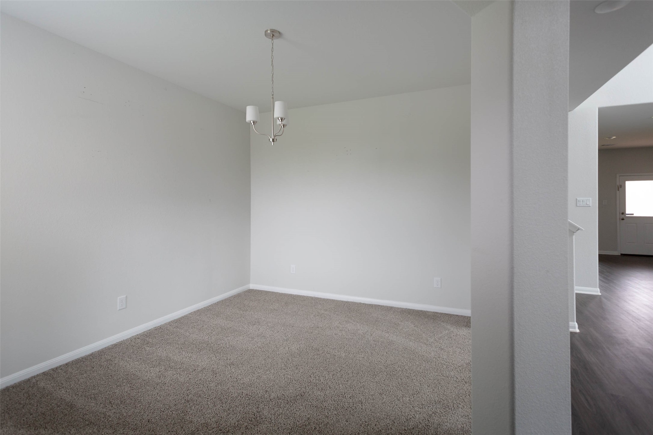 14212 Shasta Ridge Drive Conroe, TX 77303 - Photo 5 of 21 a view of empty room with wooden floor