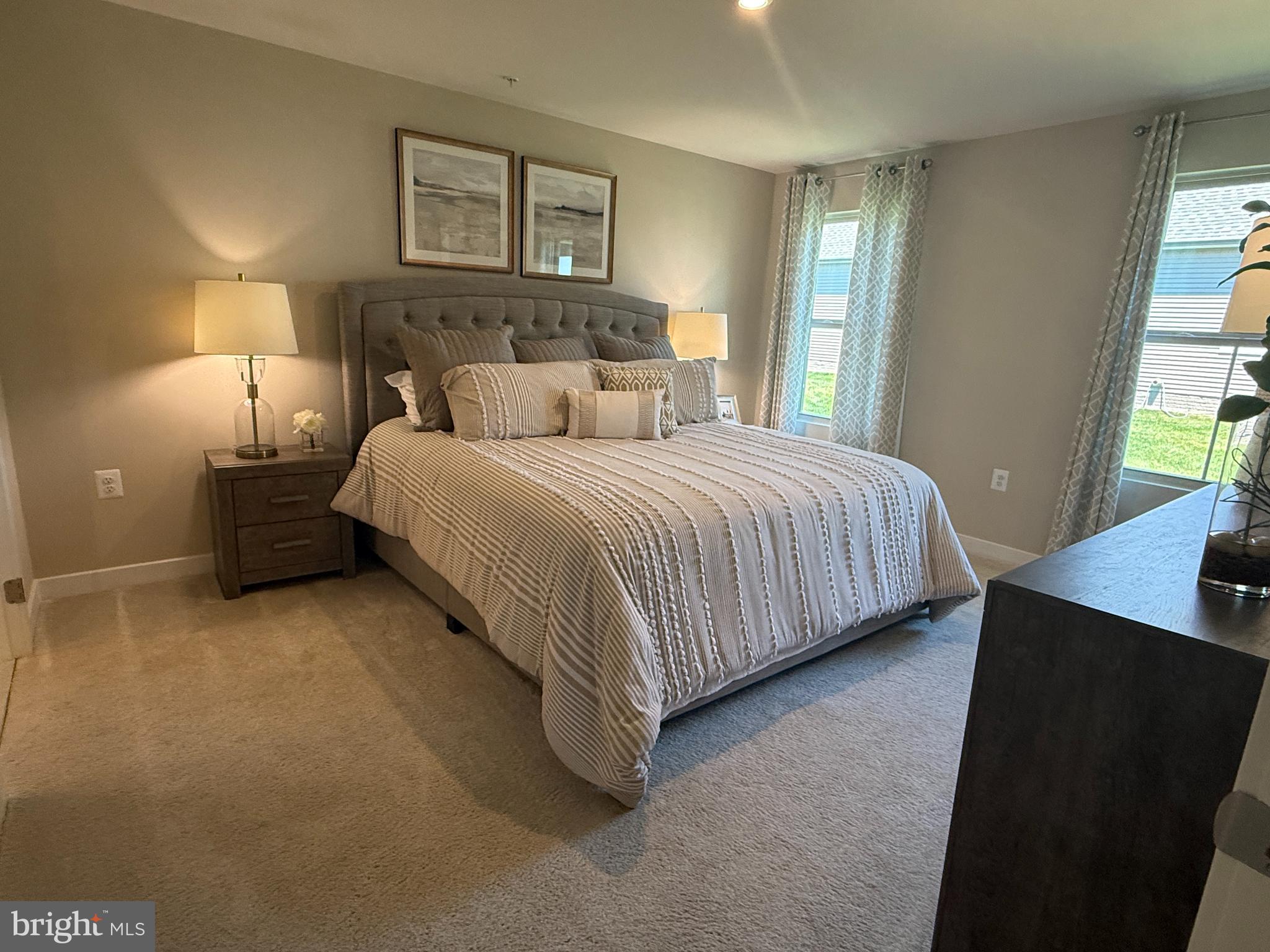 2506 Crown Point Circle Frederick, MD 21702 - Photo 15 of 21 a bed room with a bed and a night stand